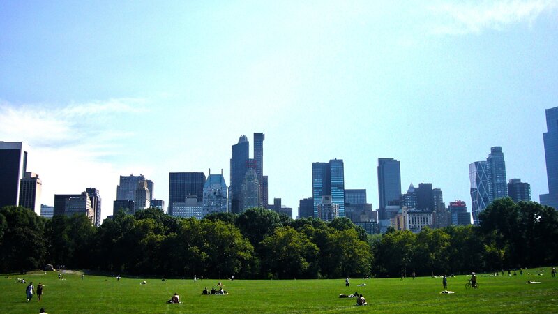 People in Park with City — Green