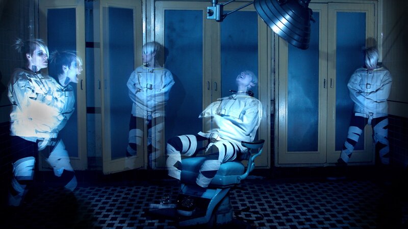 People in restraint chairs