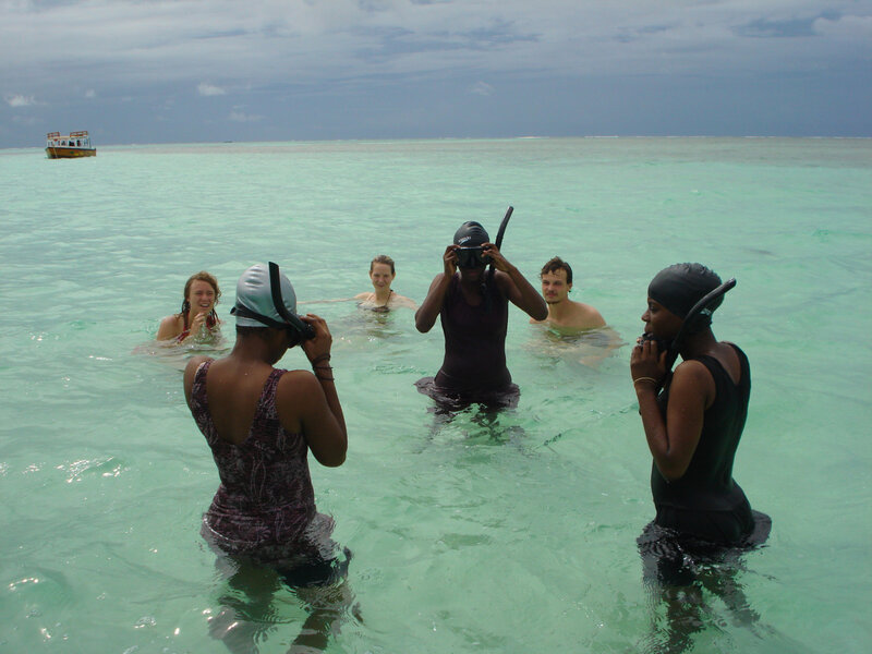 People in Snorkeling Gear
