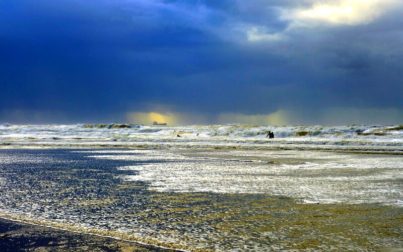 People in Stormy Ocean