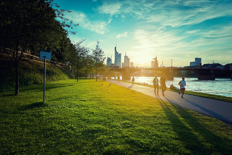 People jogging by the river