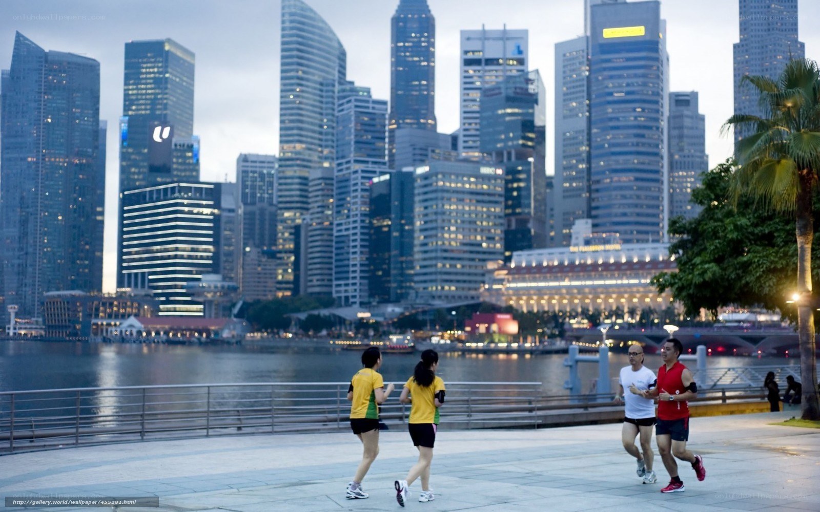 People jogging by waterfront