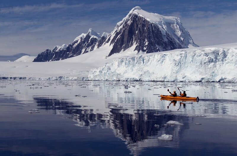 People Kayaking in Ice