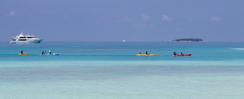 People Kayaking in Ocean
