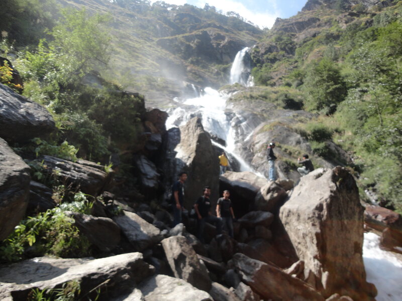 People Near Waterfall