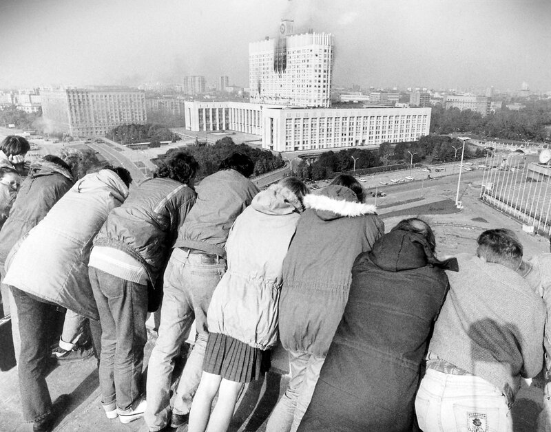 People observing from a rooftop