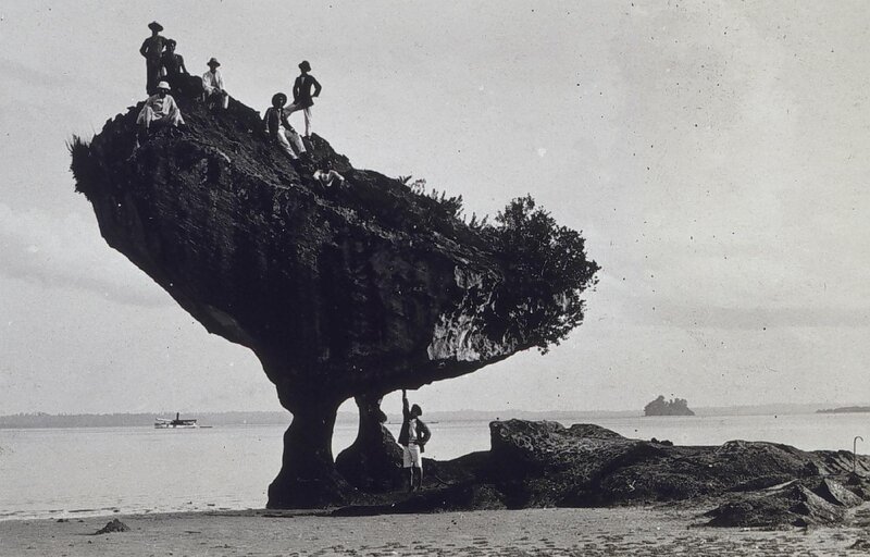 People on a balancing rock