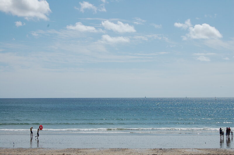 People on a Beach — Blue, Calm, Afternoon
