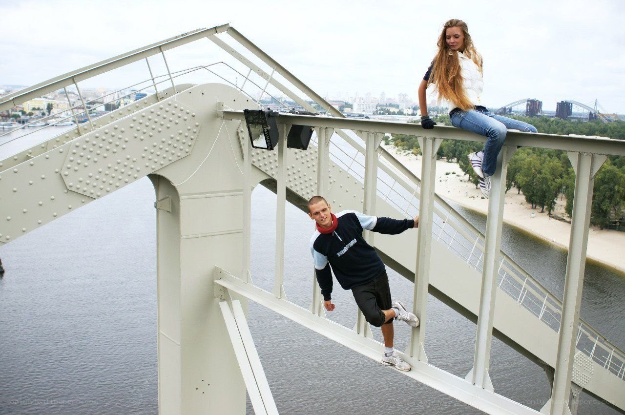 People on a bridge structure