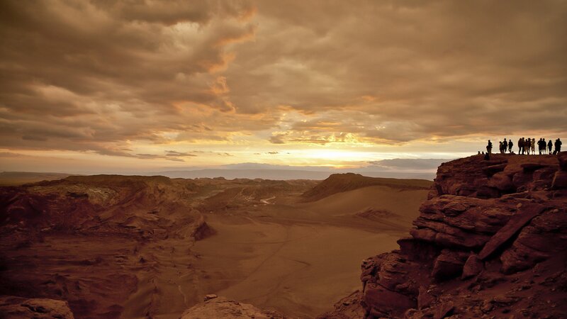 People on a Cliff Edge — Brown