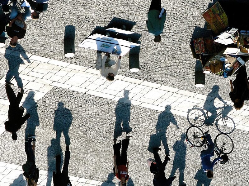 People on a cobblestone street