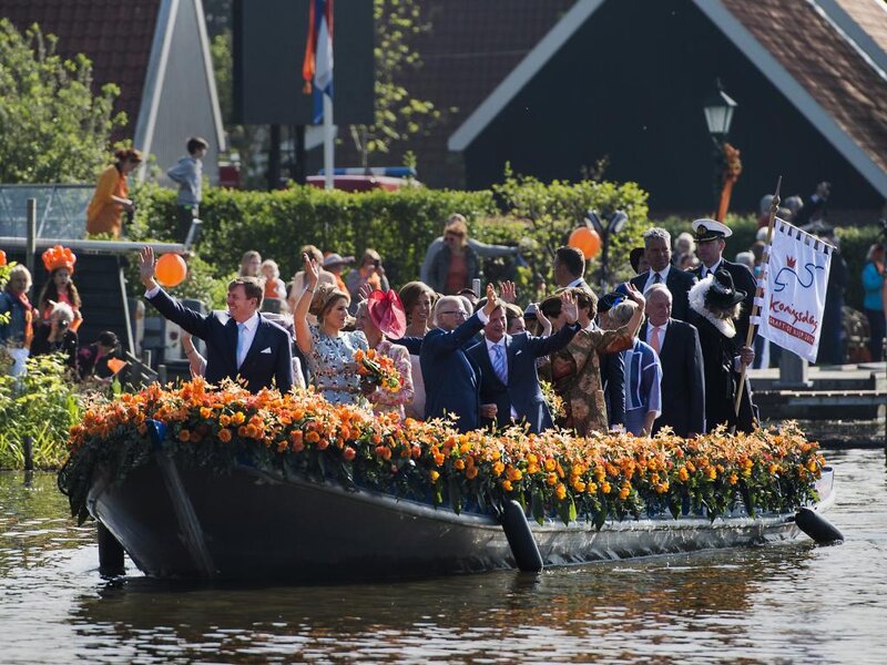 People on a Flower-decorated Boat