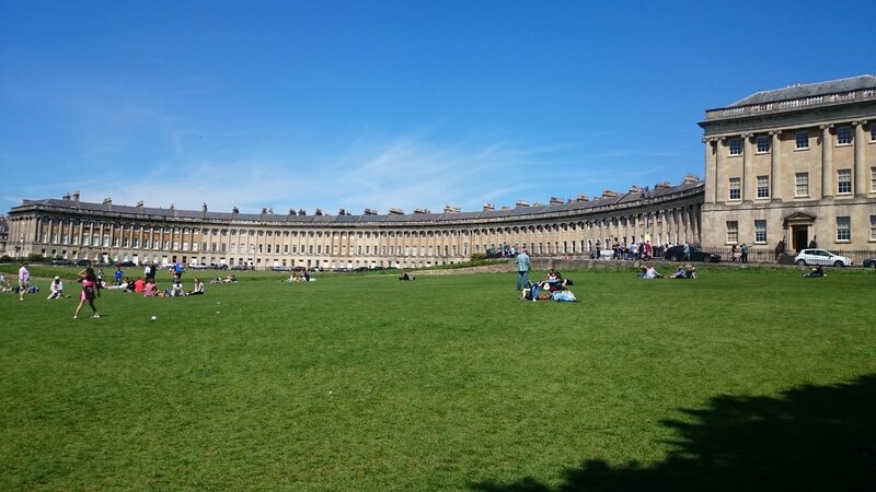 People on a Grassy Field