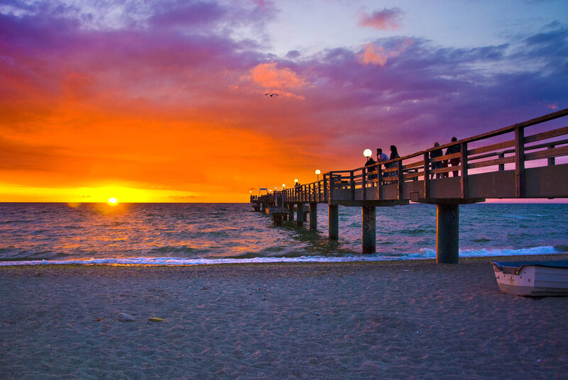 People on a Pier at Sunset