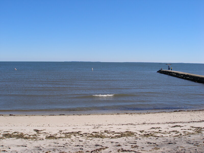 People on a Pier — Blue, Calm, Afternoon