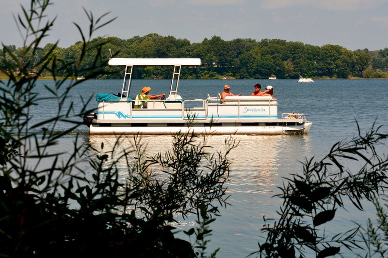 People on a Pontoon Boat — Blue