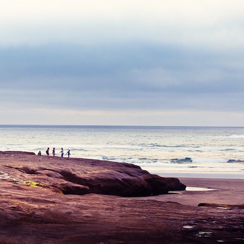 People on a rocky beach