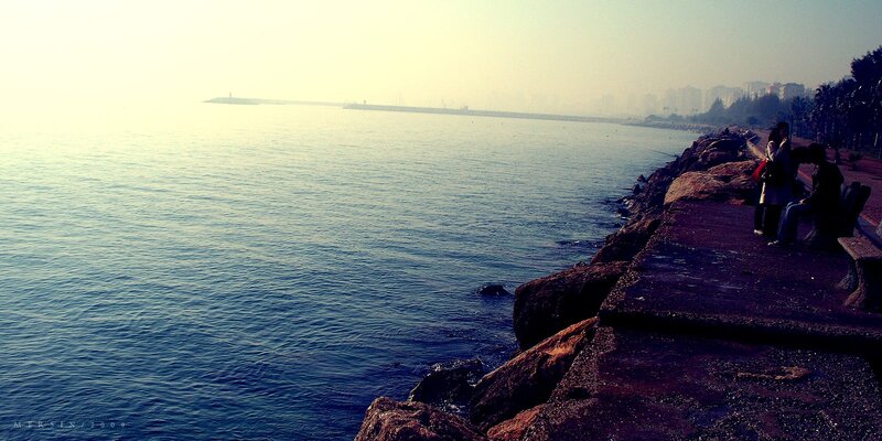 People on a seaside promenade