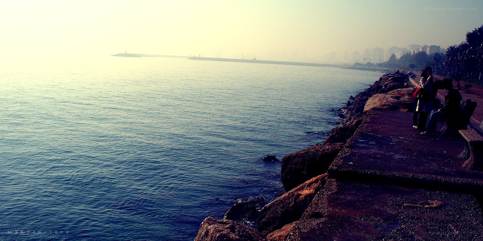 People on a seaside promenade