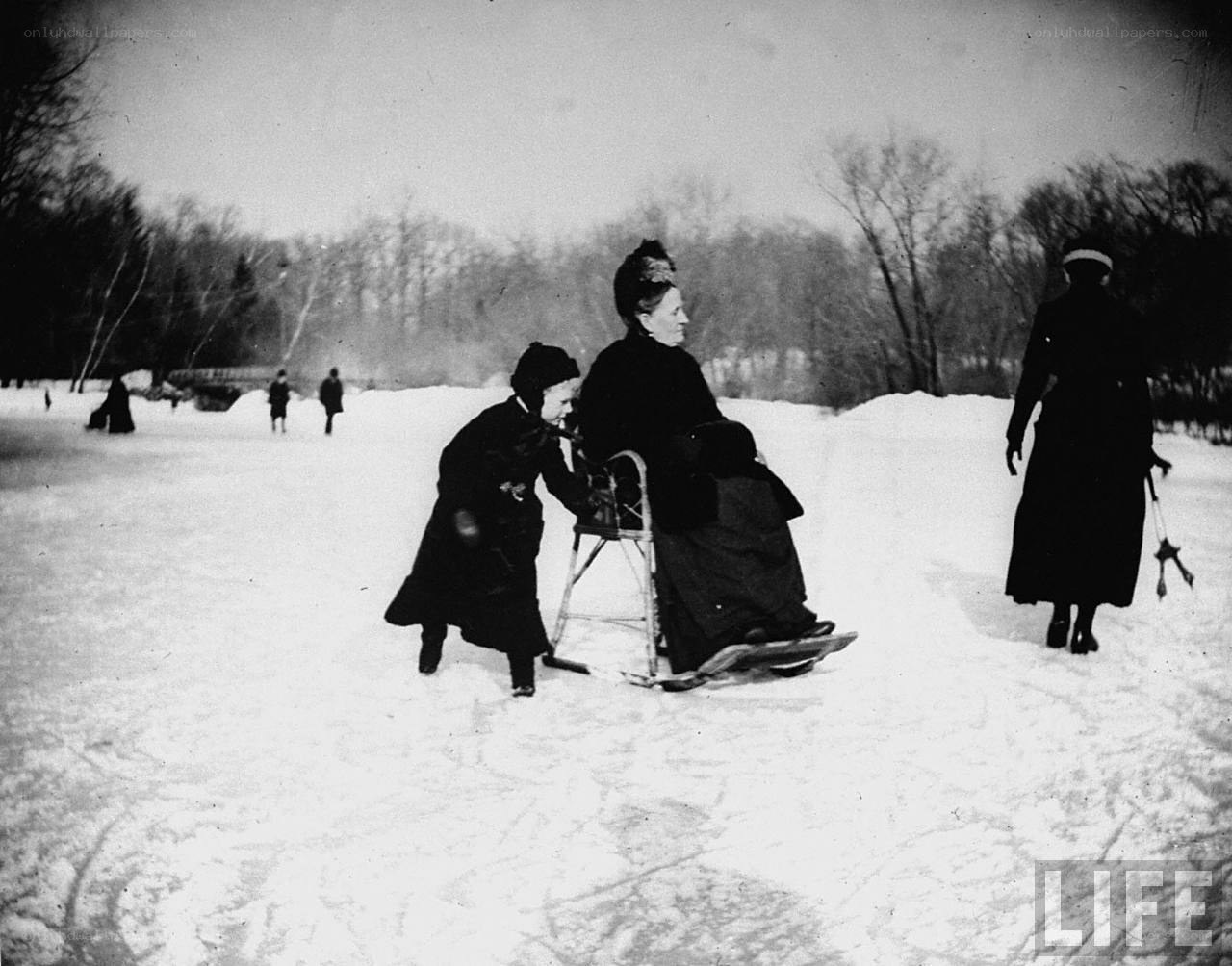People on a sled in snow