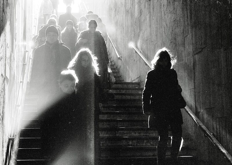 People on a Staircase in Light