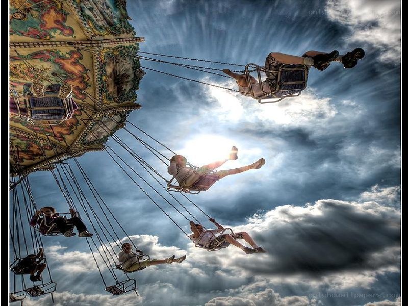 People on a swinging ride