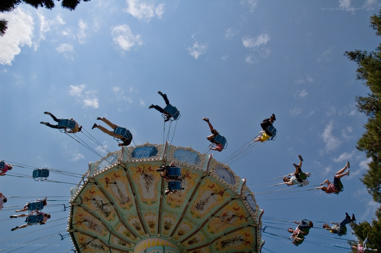 People on a swinging ride