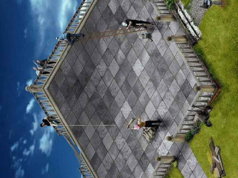 People on a tilted building