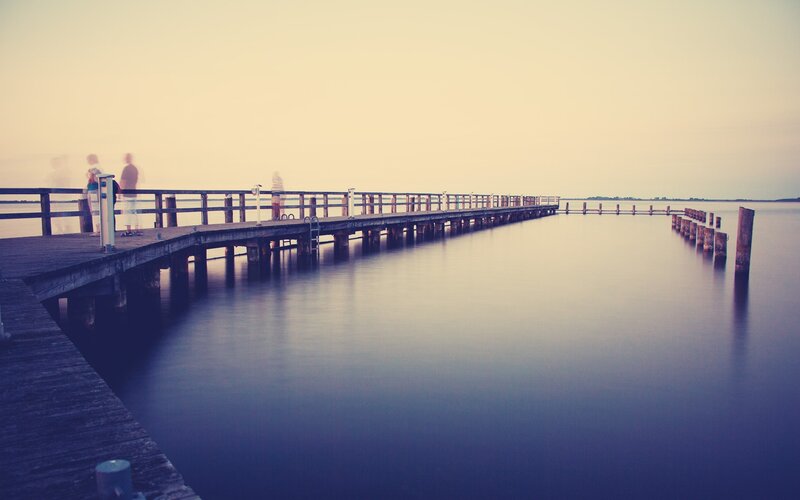 People on a Wooden Pier