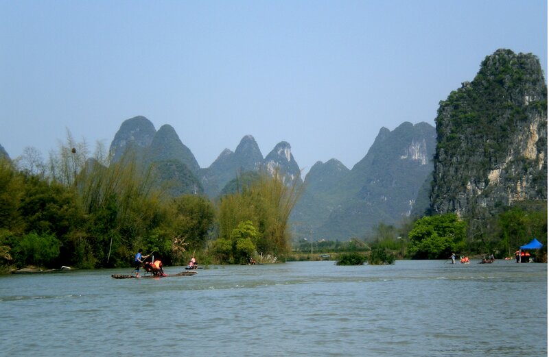 People on Bamboo Rafts