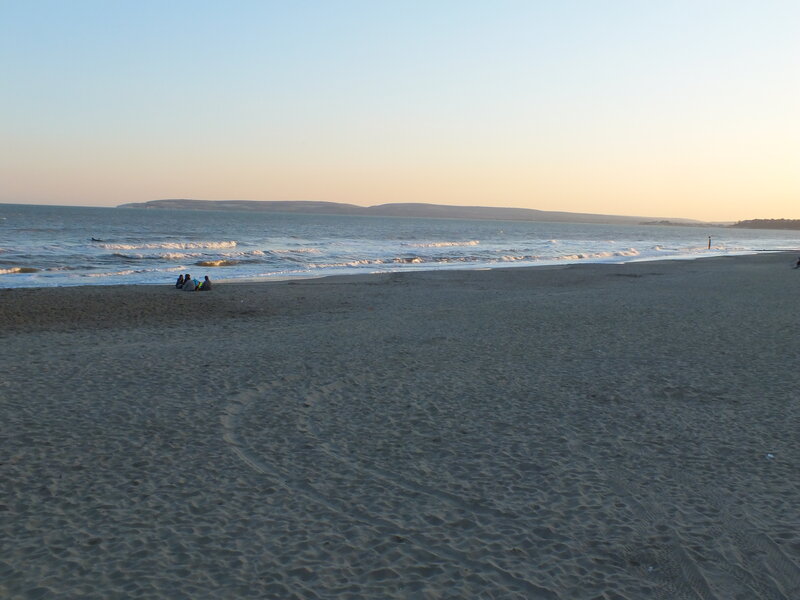 People on Beach at Sunset — Blue