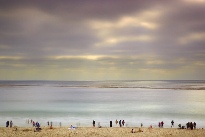 People on Beach at Sunset — Gray, Serene