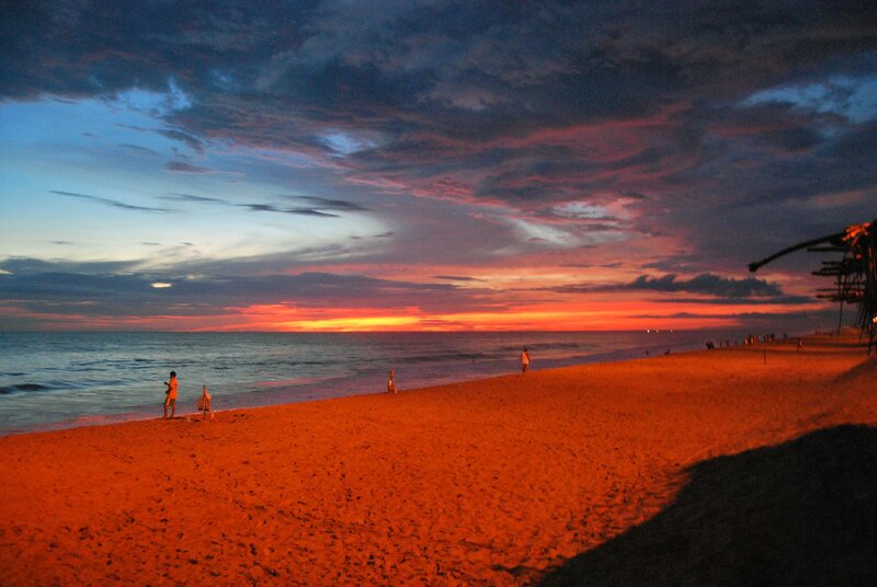 People on Beach at Sunset — Orange, Dramatic, Photograph
