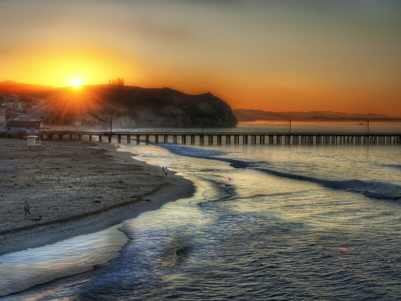 People on Beach at Sunset — Orange, Serene