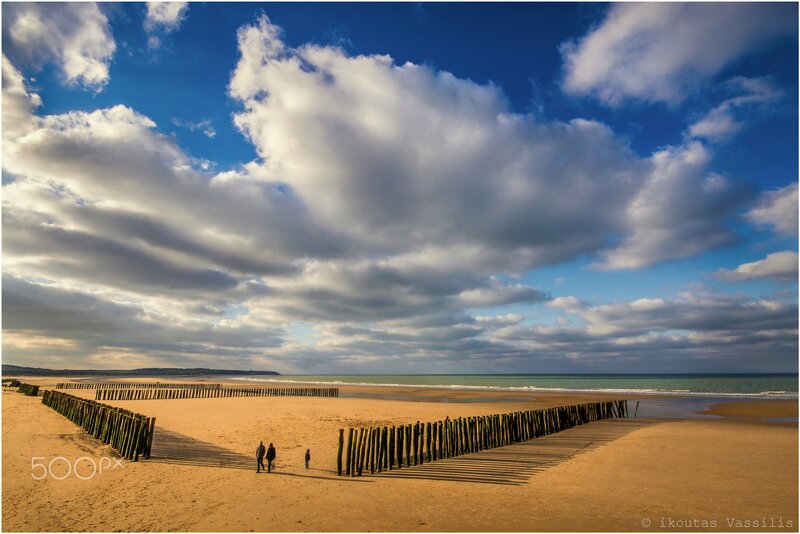 People on Beach — Blue, Dramatic, Afternoon, Photograph