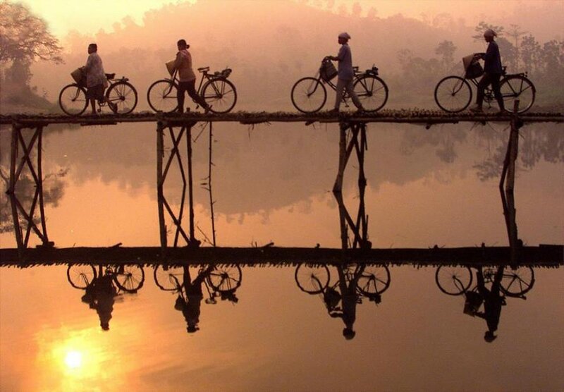 People on Bicycles — Orange