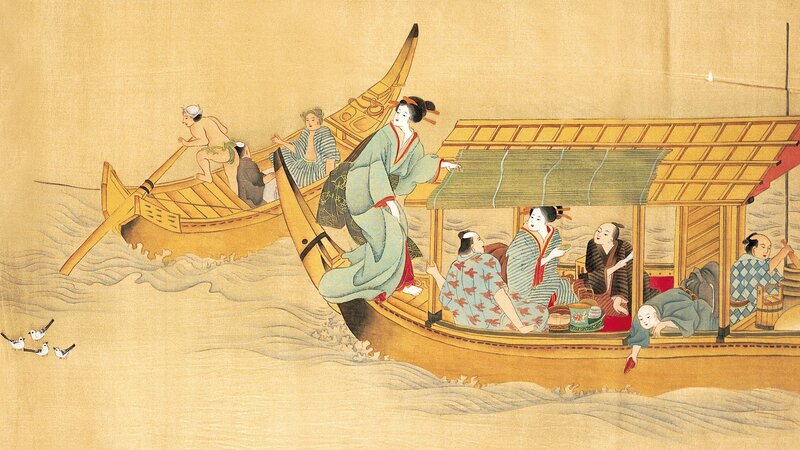 People on boats in traditional attire