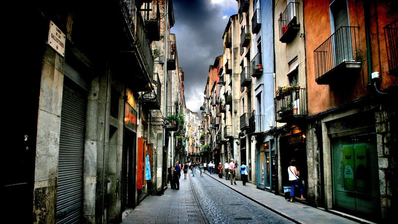 People on Cobblestone Street — Gray, Dramatic