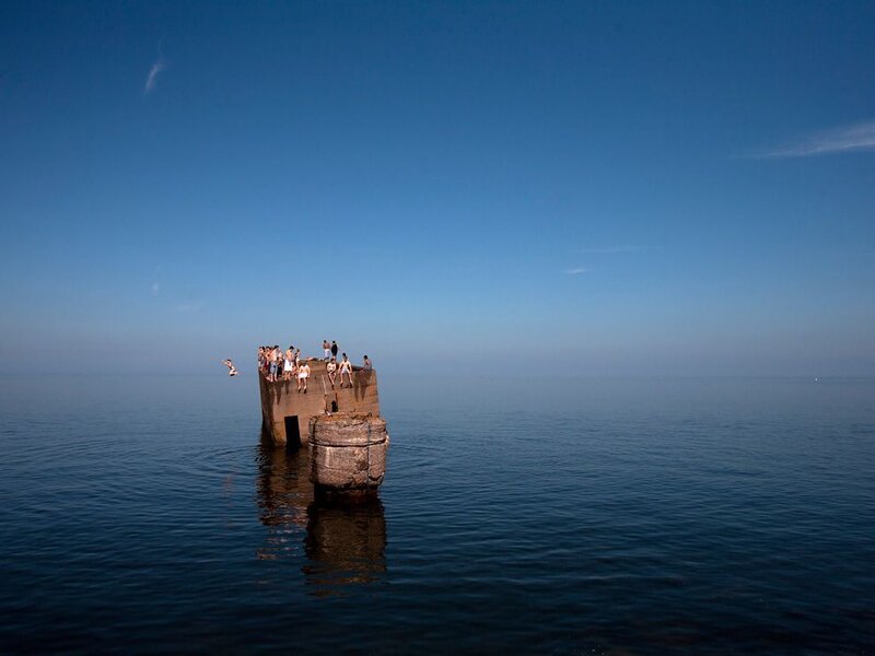 People on Concrete Pier