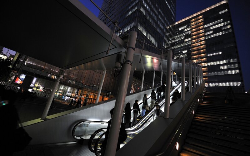 People on Escalator at Night — Black