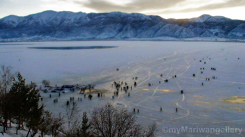 People on Frozen Lake — White