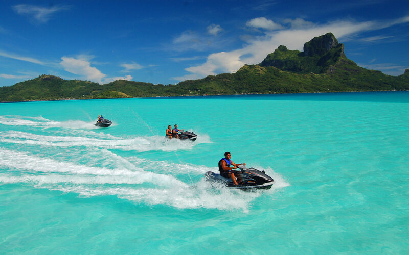 People on Jet Skis — Blue