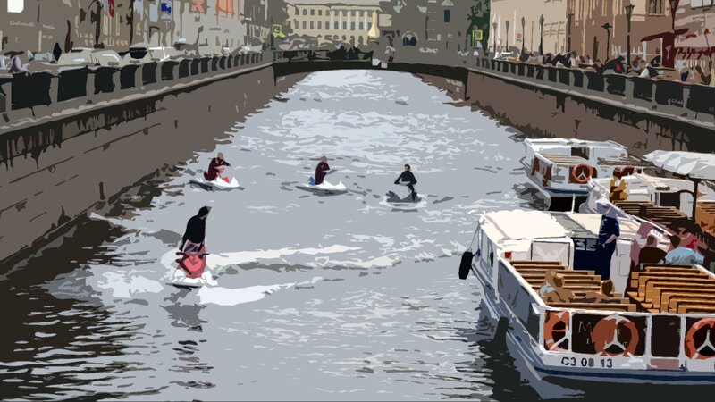 People on jet skis in canal