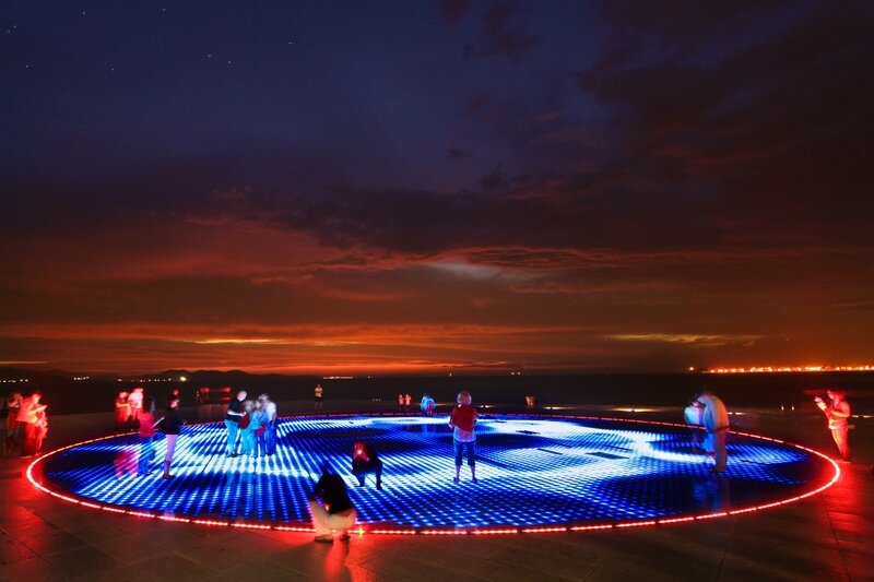 People on Lighted Platform