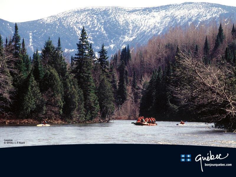 People on Rafts in River