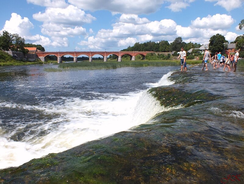 People on River Rocks