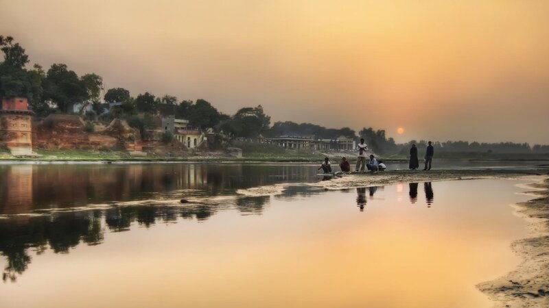 People on Riverbank — Orange