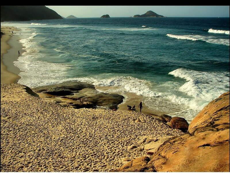 People on Rocky Beach — Blue, Serene, Afternoon, Photograph, Ocean