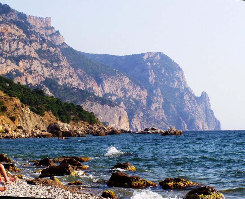 People on Rocky Beach — Blue, Serene, Afternoon