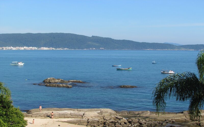 People on Rocky Beach — Blue, Serene